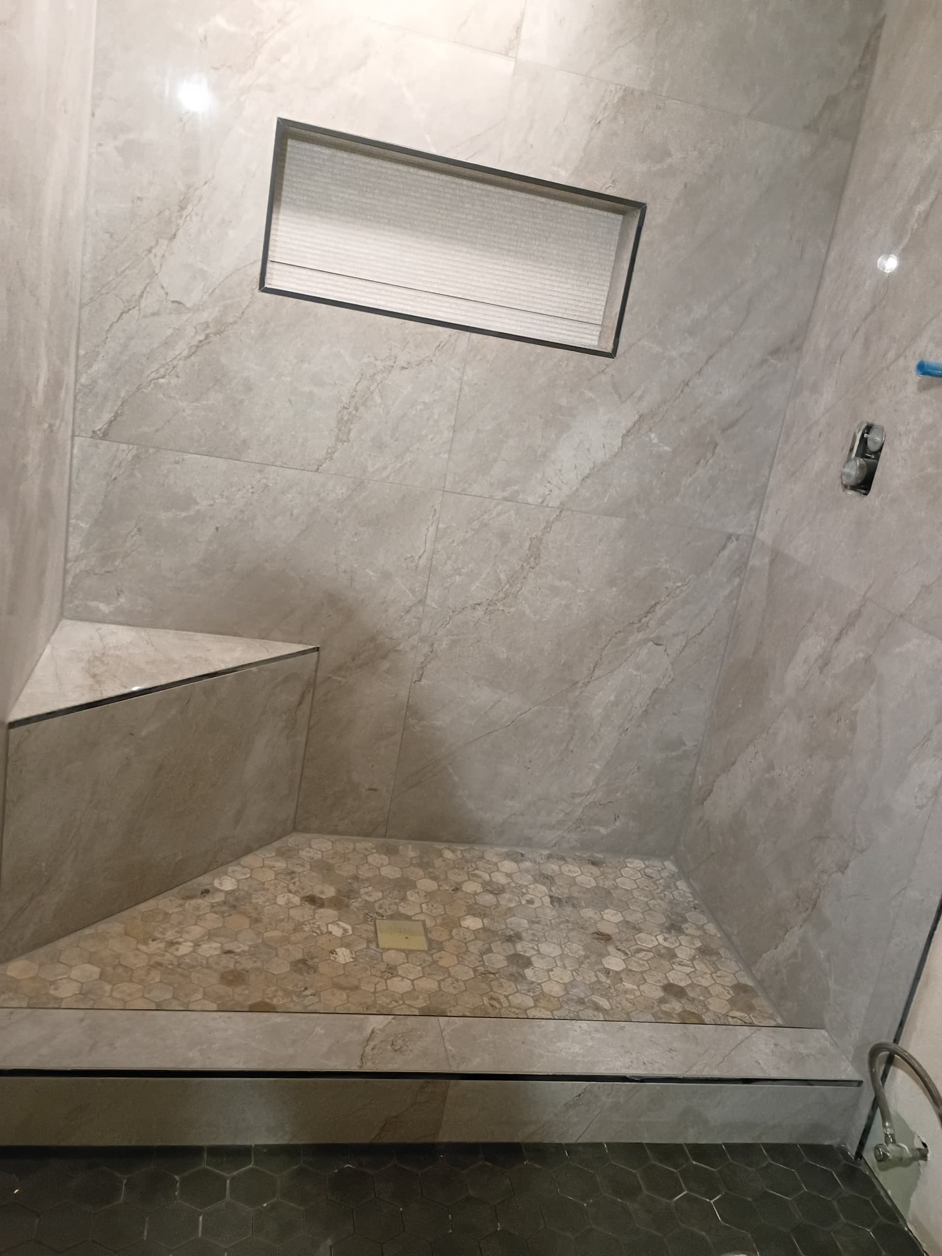 Bathroom Makeover Featuring Marble and Hexagonal Tiles