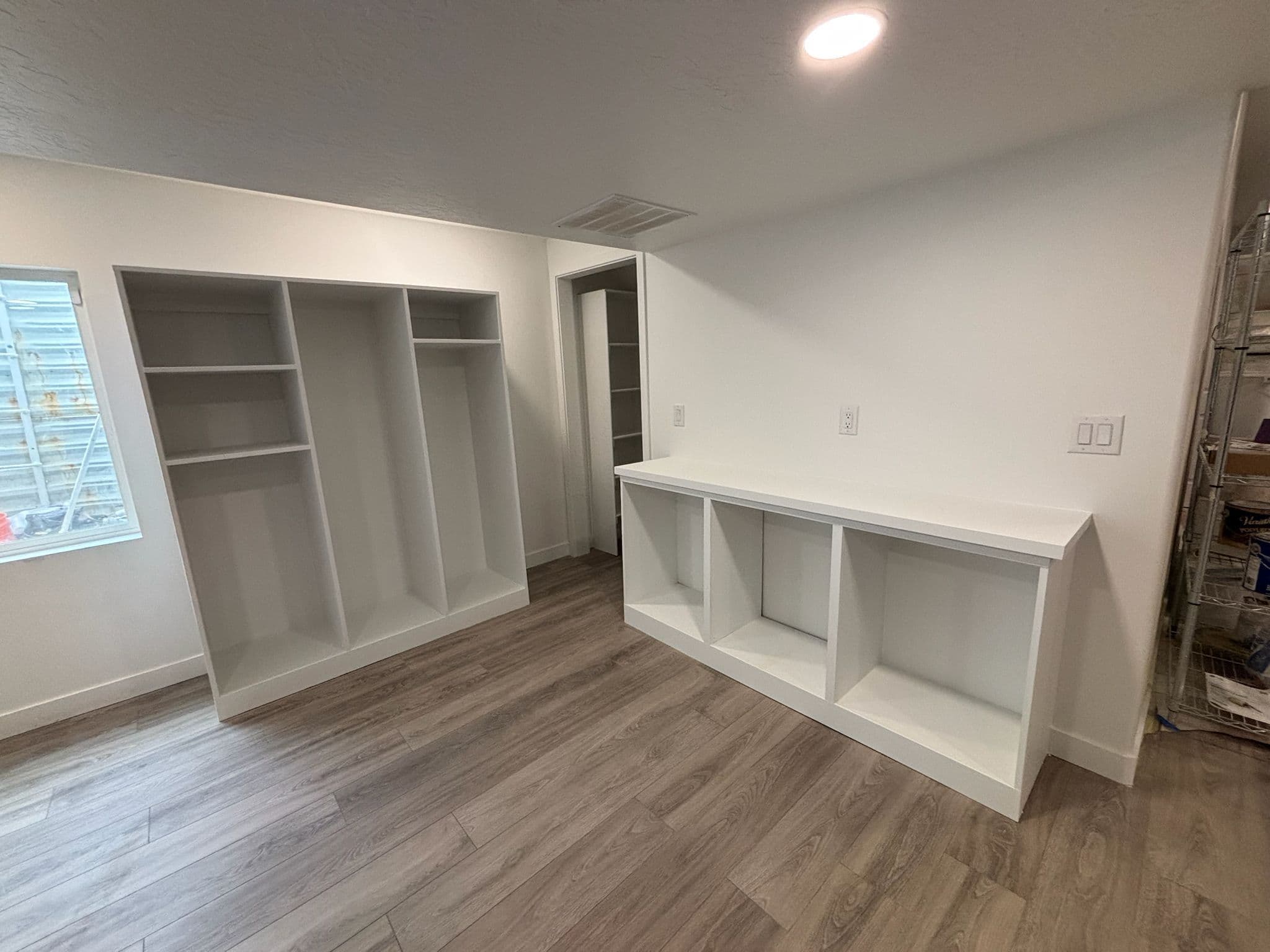 Project Modern Basement Transformation with Built-Ins image